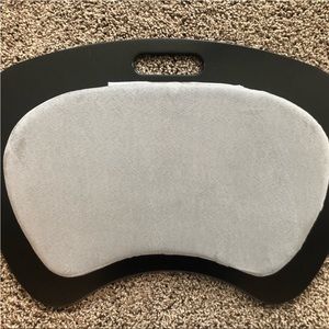 Ergonomic design lap top table with cushion and handle